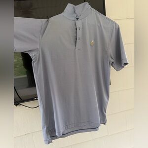 Winged Foot logo. Peter Millar summer comfort golf polo